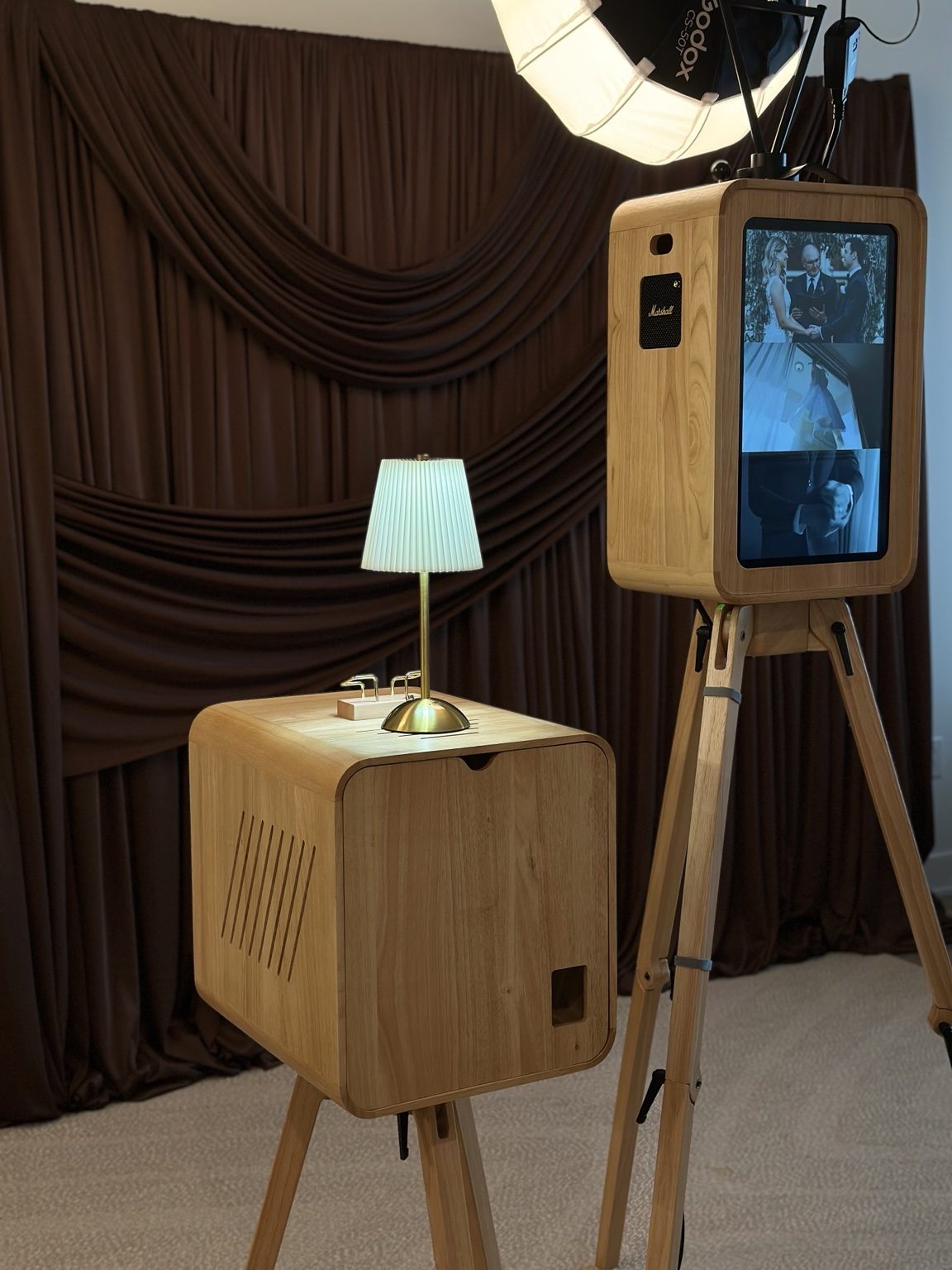 La Memorya wooden open-air photo booth with drape styling